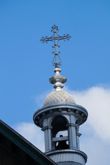 Fototapeta na wymiar Old Bell Tower and Cross