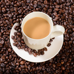 coffee cup on coffee bean