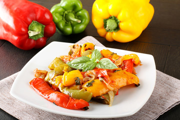 Peperonata: peppers cut into slices and baked in a pan