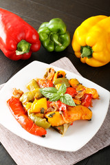 Peperonata: peppers cut into slices and baked in a pan