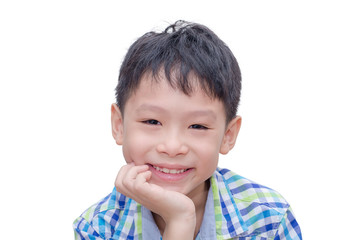Asian boy smiles over white background
