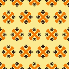 Pattern with crossed bones and paw prints