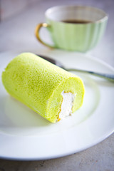 green roll cake with coffee