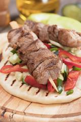 Souvlaki or kebab on pita bread