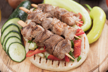Souvlaki or kebab on pita bread