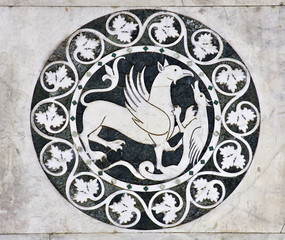 Lucca - detail from St Martin's Cathedral facade. Tuscany