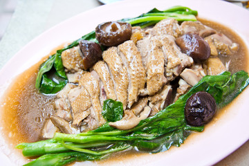 Stewed duck with mushroom and vegetables on plate