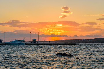 The Beautiful sunset over the sea, Paros island, Cyclades, Greece.