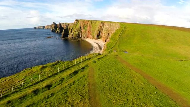 Aerial shot of the beautiful Duncansby Head sea stacks in Northern Scotland.