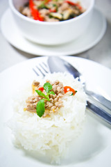 spicy pork with hot basil on stream jasmine rice