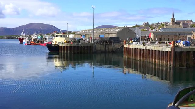 Establishing shot of the port at Stromness, Orkney Islands, Scotland.