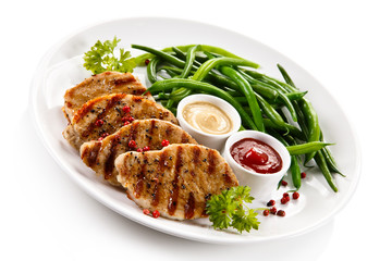 Grilled steaks and vegetables
