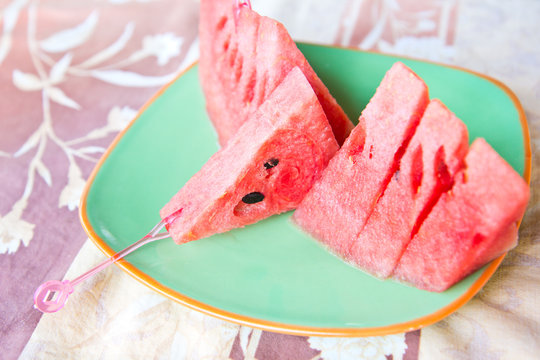 Sliced ripe watermelon on plate