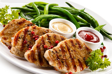 Grilled steaks and vegetables