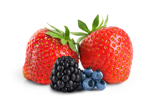 Strawberries, blueberries and blackberries isolated on white bac