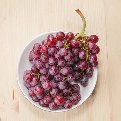 fresh grapes on wood table