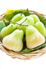 green rose apple on the basket