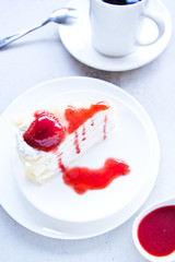 Crape cake with strawberry sauce