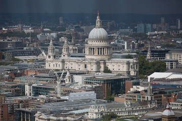 Fototapeta na wymiar LONDON, UK - SEPTEMBER 17, 2015: London panorama. St. Paul's cathedral against of raining dark sky