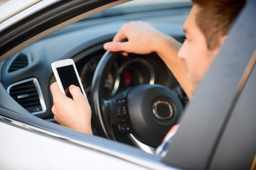 Pleasant man driving a  car