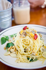 Closeup to spaghetti with clams and parsley