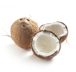coconut whole and half on a white background