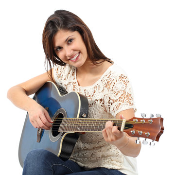 Musician woman playing guitar in a course
