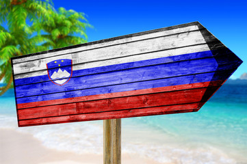 Slovenia Flag wooden sign on beach background