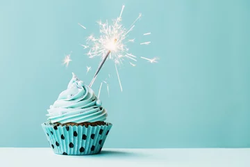 Fotobehang Cupcake with sparkler © Ruth Black