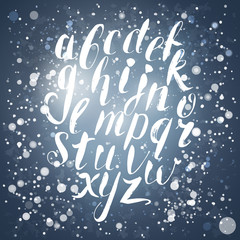 Winter calligraphy english alphabet with snow