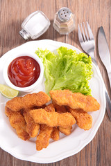 chicken nugget and ketchup
