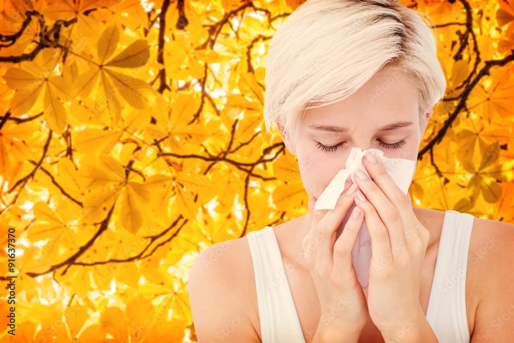 Canvas Prints Composite image of sick woman blowing her nose