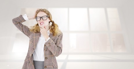 Composite image of geeky hipster thinking