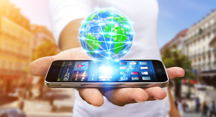 Businessman surfing on internet with modern mobile phone