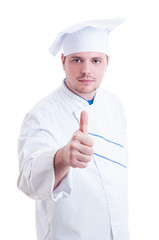 Confident cook or chef showing like or thumb-up gesture