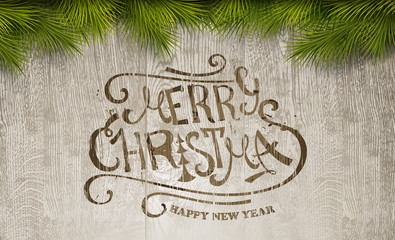 Christmas typography on wooden texture
