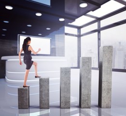 Composite image of businesswoman stepping up