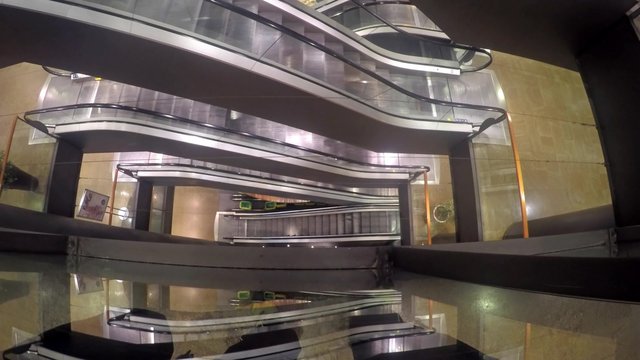 4k escalators at the modern shopping mall. UHD stock footage