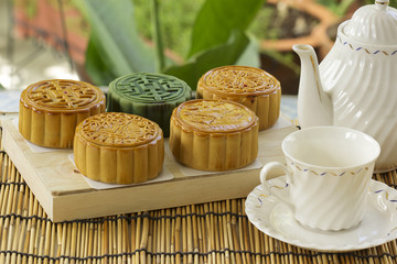 Moon cake on the tray Jug of tea