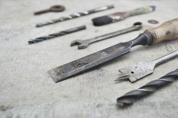 Fototapeta premium Assorted old work tools on wooden