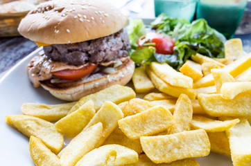 Cheese burger - American cheese burger with Golden French fries