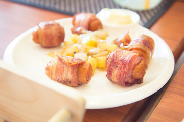 Bacon roll with sausage