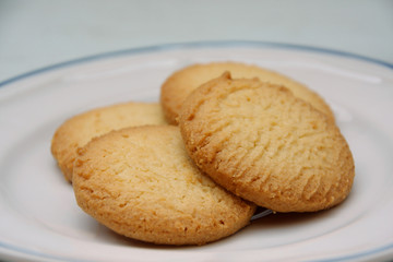 close up cookies on white dish