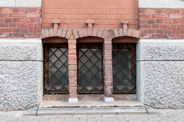 element of the architecture of three window with bars