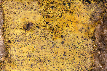  texture of the old hardware with a shabby yellow paint