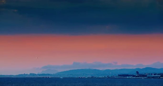 France, Nice, 12.09.2015: Nice airport at sunset, Aircraft take off and land with parking lights