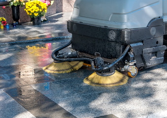 process of cleaning walkways in the machine
