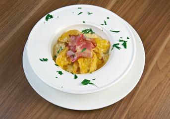 potato gnocchi with cheese and bacon.