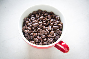 Roasted coffee in red cup
