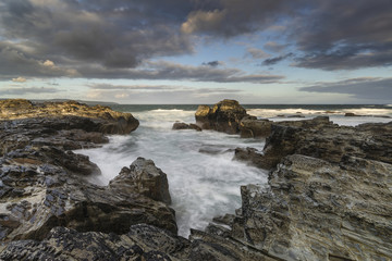 Beautiful sunrise landscape of Godrevy on Cornwall coastline in